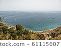 Turquoise Mediterranean sea in Taormina Sicily 61115607