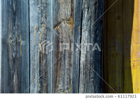 Old shabby wooden planks with cracked color paint 61117921