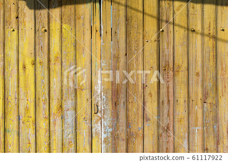 Old shabby wooden planks with cracked color paint 61117922