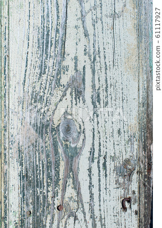 Old shabby wooden planks with cracked color paint 61117927