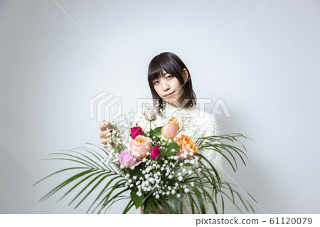 Woman with a bouquet 61120079