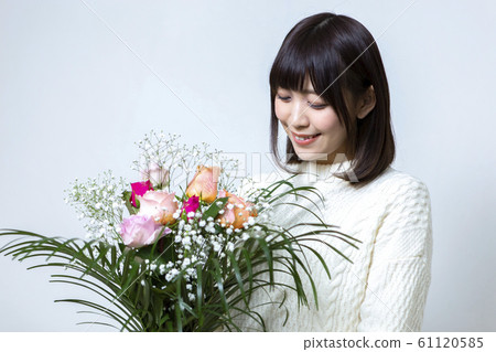 Woman with a bouquet Woman with a bouquet 61120585