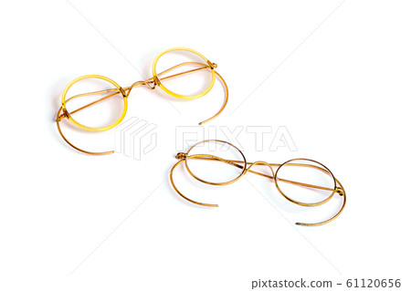 Golden old fashion glasses isolated on white background 61120656