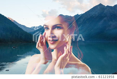 Double exposure of young woman and nature landscape. 61121958