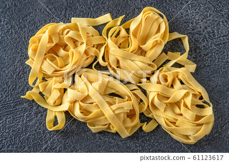Raw pappardelle pasta Raw pappardelle pasta 61123617