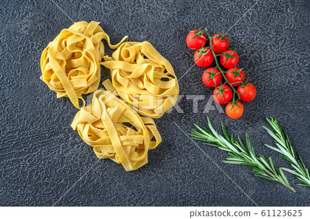 Raw pappardelle pasta Raw pappardelle pasta 61123625