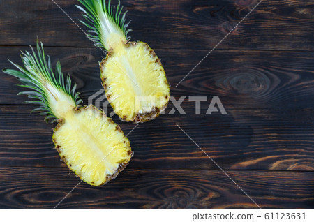 Pineapple on the table 61123631