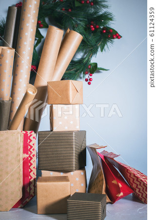 Packing gifts in kraft beige vintage wrapping 61124359