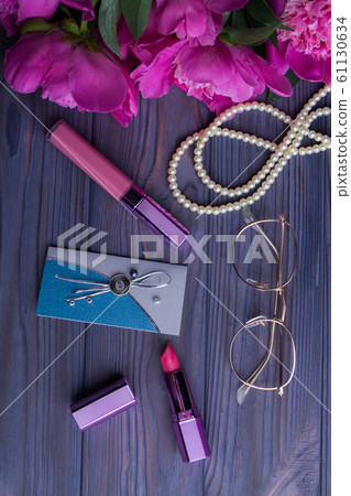 Woman's belongings flat lay. Woman's belongings flat lay. 61130634