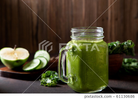 kale smoothie in a glass jar 61130686