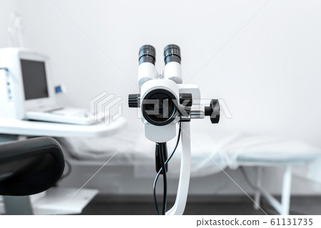 Colposcope in the gynecologist's office. Female Colposcope in the gynecologist's office. Female 61131735