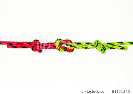 Reef, Hercules, square, double or brother hood Binding knot binding two colored red and green ropes. nautical loop used to secure rope or fishing line around an object. Isolated on white background 61131840