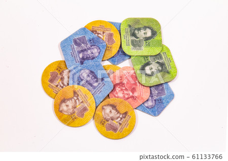 Pile of folded plastic money 1,3,5,10 ruble Isolated on white background. Coins of different shapes for visually impaired people. Unrecognized Republic of Transnistria declared its independence. 61133766