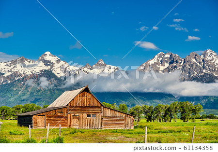 Old barn in Grand Teton Mountains Old barn in Grand Teton Mountains 61134358