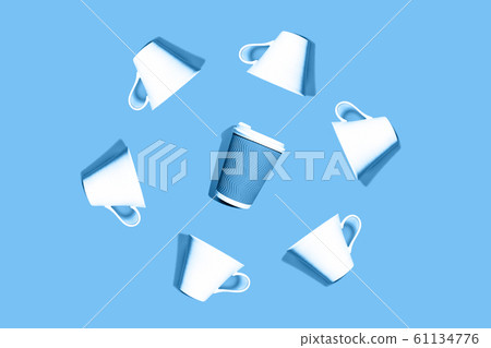 Coffee pattern of white ceramic and blue paper cup for coffee on classic blue background. 61134776