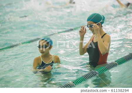 Kids swimming Kids swimming 61138294