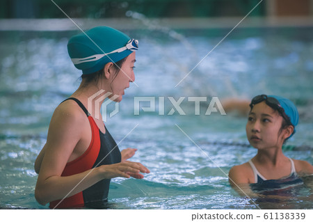 Kids swimming Kids swimming 61138339