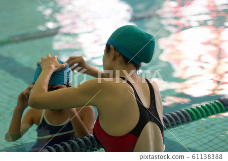 Kids swimming Kids swimming 61138388