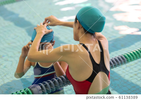 Kids swimming Kids swimming 61138389