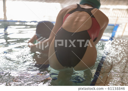 Kids swimming Kids swimming 61138846