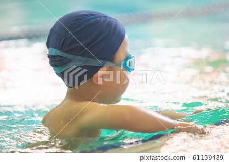 Kids swimming Kids swimming 61139489