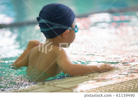 Kids swimming Kids swimming 61139490