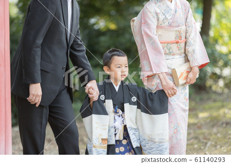 festival day for children of three, five and seven years of age, family, boy 61140293