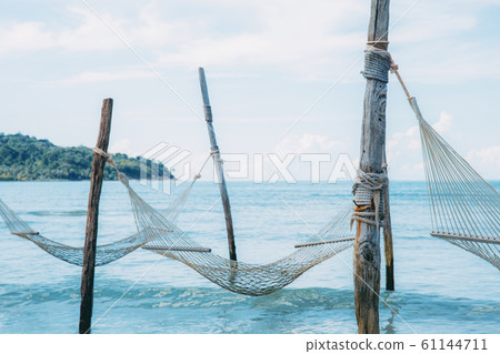 Hammock at sea. Hammock at sea. 61144711