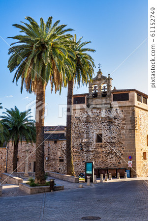 Narrow alley with old stone buildings at Caceres, 61152749