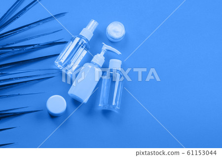 Generic beauty products on classic blue background 61153044