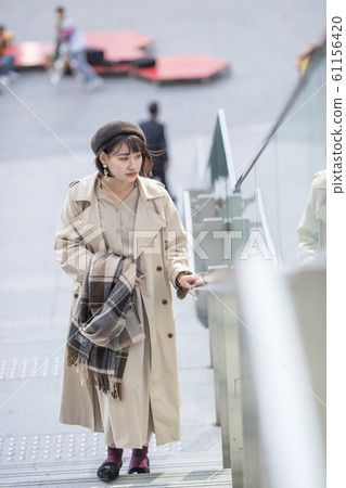 One young woman on holiday 61156420