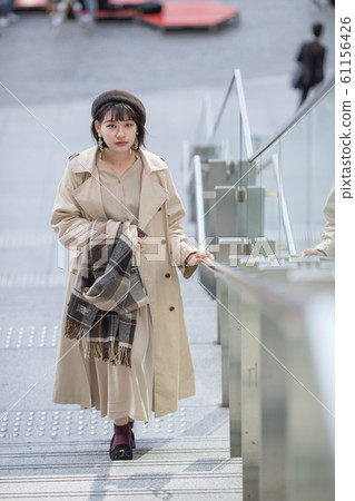 One young woman on holiday 61156426