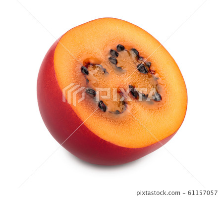 Fresh tamarillo fruit half isolated on white background Fresh tamarillo fruit half isolated on white background 61157057
