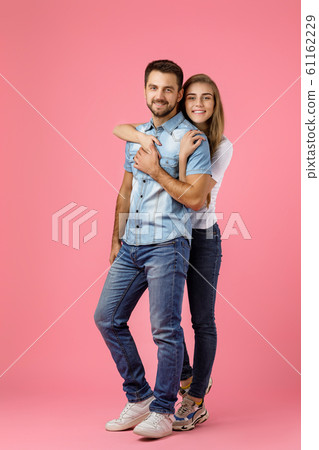 beautiful happy couple in love are hugging beautiful happy couple in love are hugging 61162229