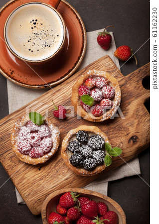 Set of cakes with berries Set of cakes with berries 61162230