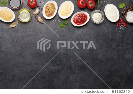 Set of various sauces. Popular sauces in bowls 61162240