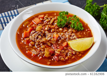 close-up of lentil soup in a white bowl 61162906