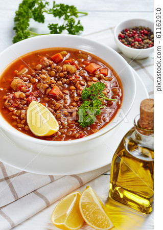 lentil soup with vegetables in a bowl 61162910