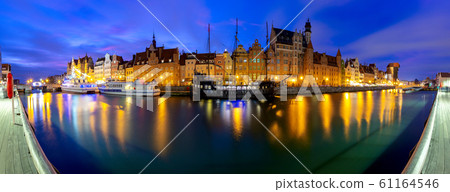 Gdansk. Panorama of the city promenade in night illumination. 61164546