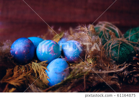 Easter eggs in the nest Easter eggs in the nest 61164875