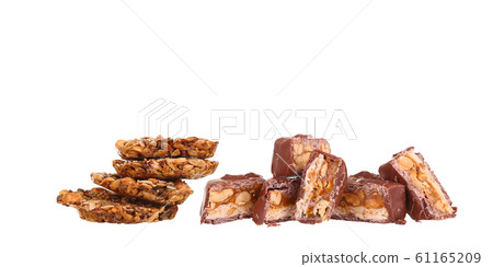 Tasty chocolate bar split in two pieces. Delicious 61165209