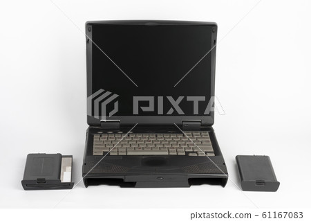 16 year old notebook, floppy disk drive and laptop 16 year old notebook, floppy disk drive and laptop 61167083