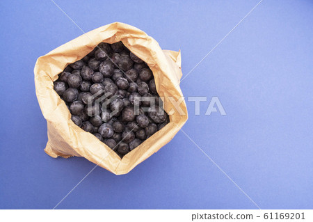 Blueberries background. Ripe and juicy blueberries 61169201