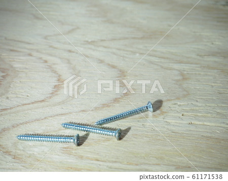 Photo of a pensive screw 61171538