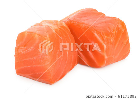 raw salmon piece cube isolated on white background close up raw salmon piece cube isolated on white background close up 61173892