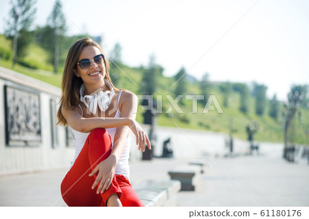 Student girl outdoors 61180176