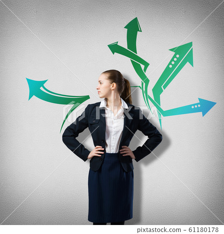 Businesswoman thinking something over Businesswoman thinking something over 61180178
