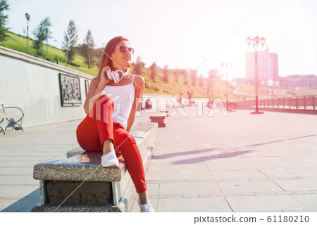 Student girl outdoors 61180210