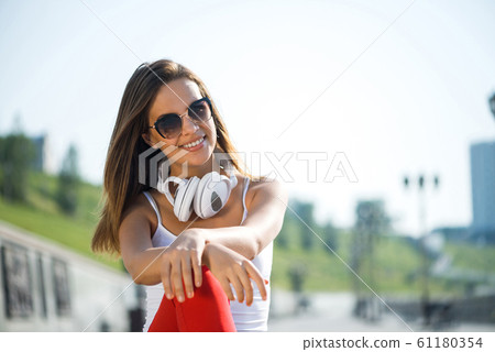 Student girl outdoors 61180354