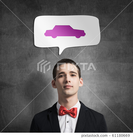 Guy and thinking balloon on concrete wall 61180669
